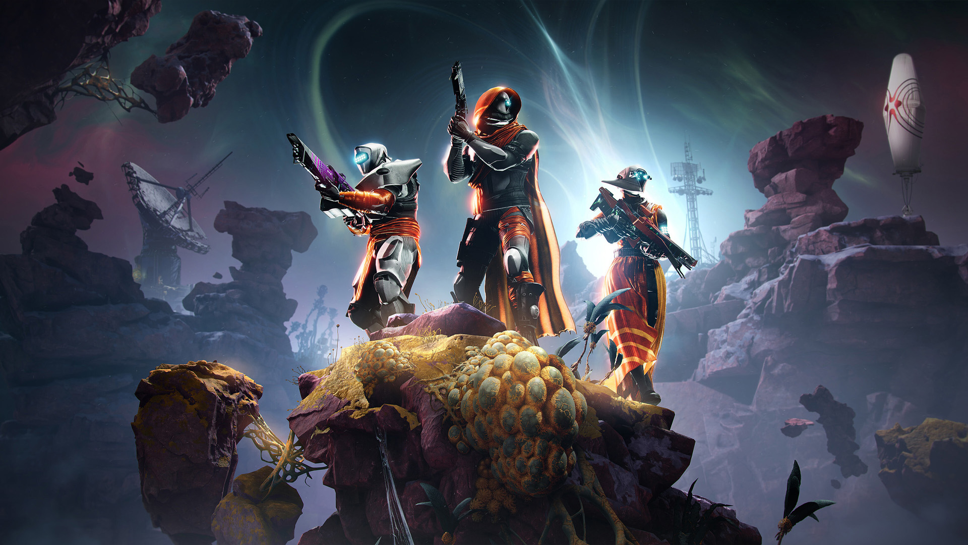 Three Guardians in futuristic armor pose on rocky terrain with colorful vegetation, set against a cosmic background in the game Destiny 2.